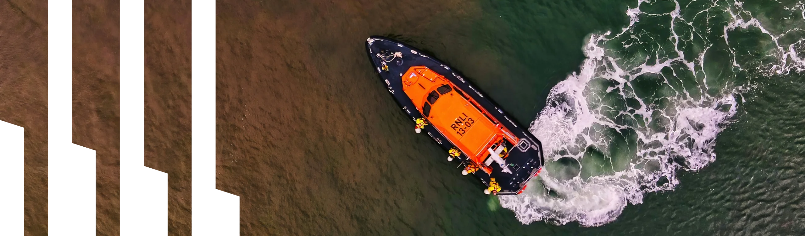 a rescue boat turning in the water