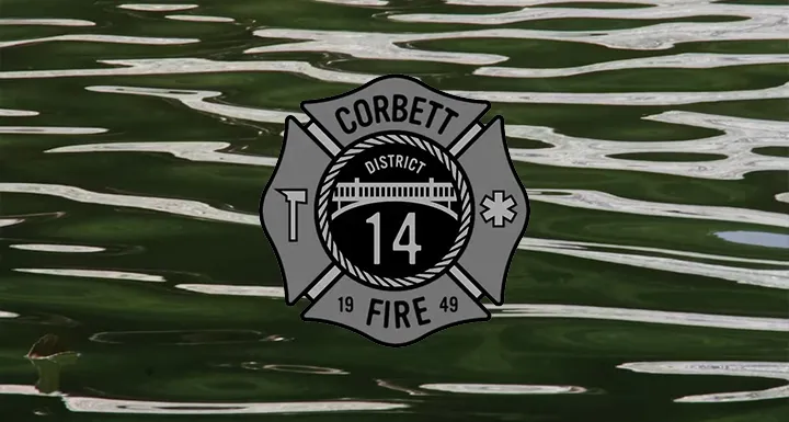 Corbett Fire Department logo on a water background