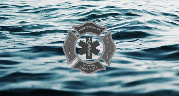 Guntersville Fire Department logo on a water background