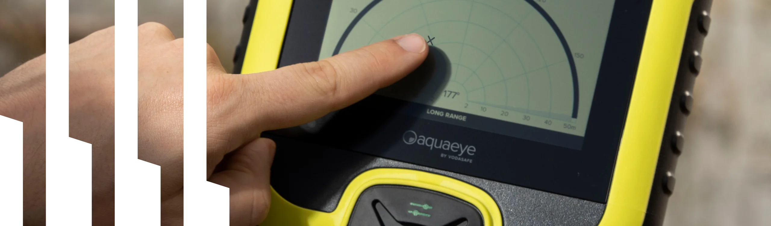 Person pointing to the x location on the AquaEye Pro screen