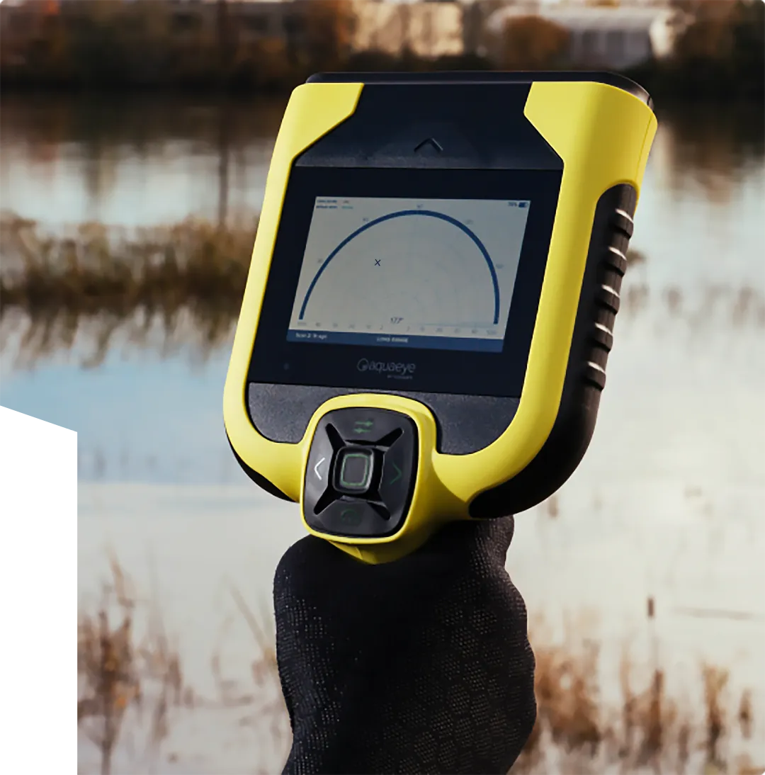 AquaEye Pro Device in front of a marsh